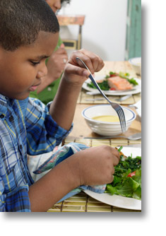 Boy eating a salad