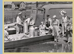 Boats being used to supply food and water during the Great Flood of 1937.