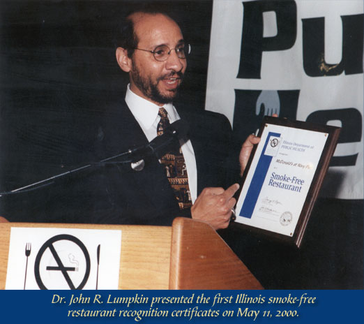 Health care workers practice administering the smallpox vaccine using an orange.