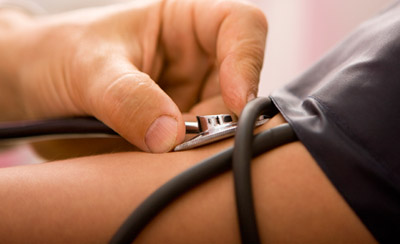 photo of patient having blood pressure taken